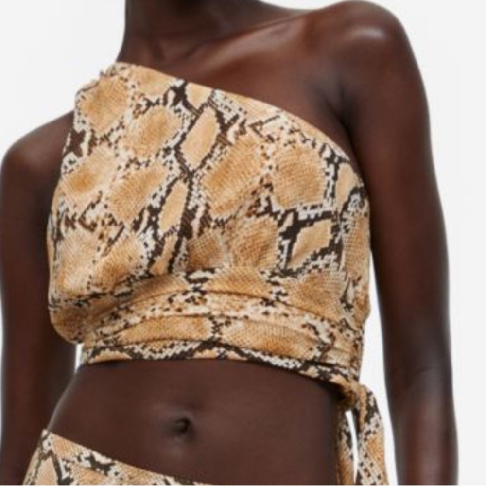 Beige/snakeskin-patterned one shoulder crop top. New without tag